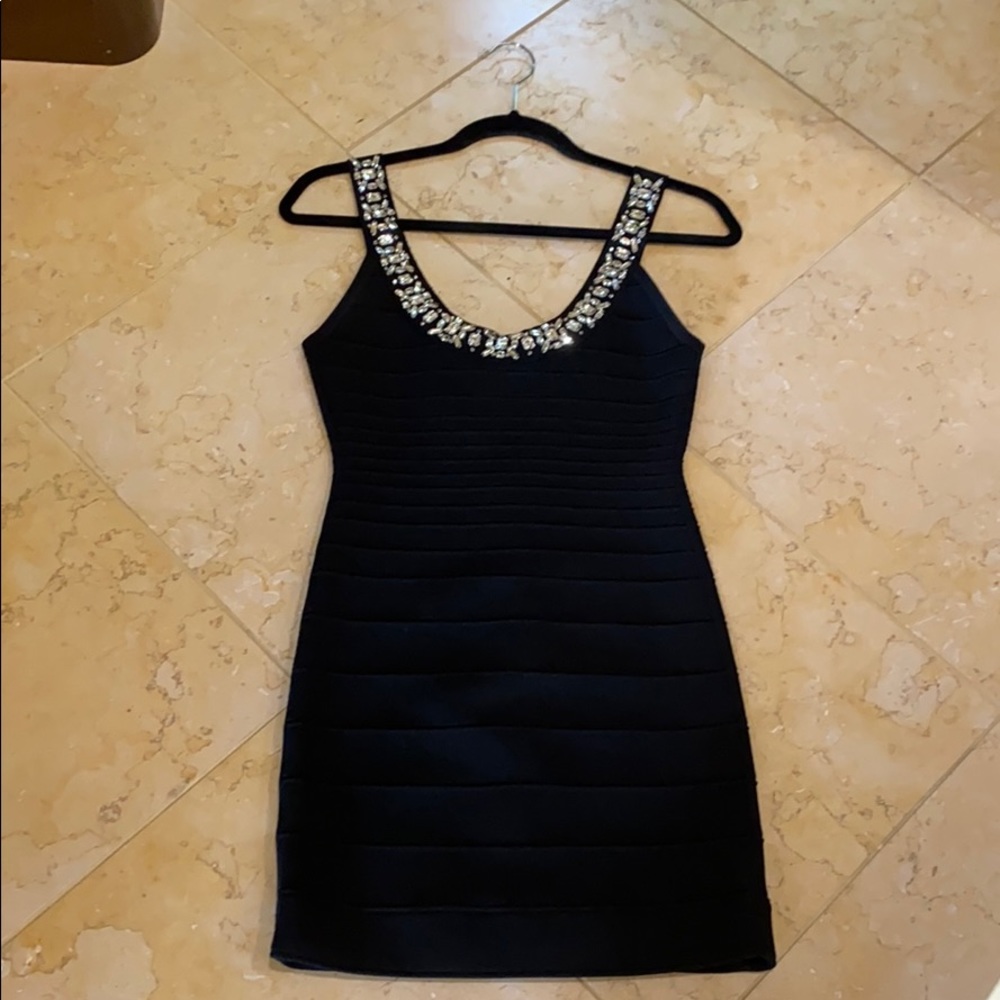 Parker Black body-con dress with jewels.